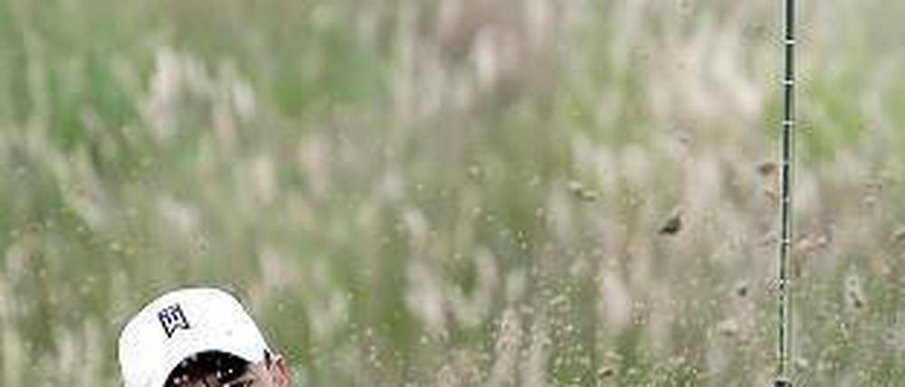 Wieder aufgetaucht. Tiger Woods beim Training in England. Foto: dpa