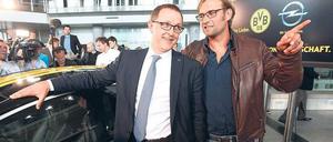 Zwei Freunde sollt ihr sein! Opel-Übergangschef Thomas Sedran und der neue Markenbotschafter des Konzerns, Fußballtrainer Jürgen Klopp. Foto: AFP