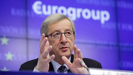 Eurogruppenchef Juncker warnt vor einem Zerfall der Euro-Zone.