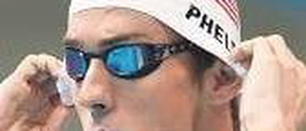 Ein Diener seines Landes. Michael Phelps weiß, was er den USA schuldig ist. Das kommt daheim gut an. Foto: AFP