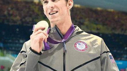 Endlich Erster. Nach der Goldmedaille in der Staffel gewann Michael Phelps sein erstes Einzelgold in London. 
