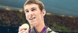 Endlich Erster. Nach der Goldmedaille in der Staffel gewann Michael Phelps sein erstes Einzelgold in London. 