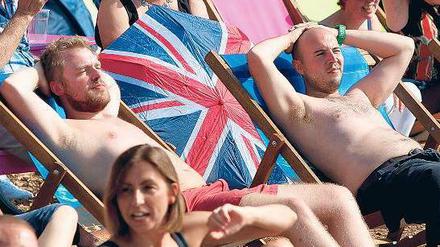 Ist das Leben nicht schön? Tausende Fans genossen im Hyde Park den Mix aus Sport und Erholung. Foto: dpa