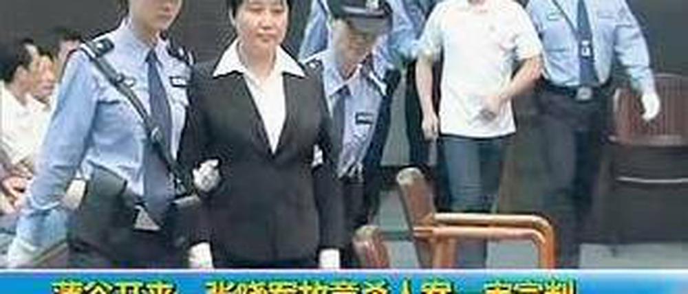 Abgeführt. Gu Kailai, Frau des chinesischen Spitzenpolitikers Bo Xilai. Foto: Reuters