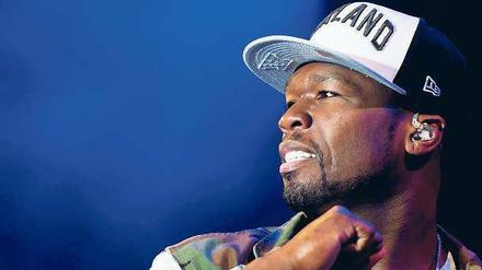 Mit Mützchen und dicker Kette. Curtis James Jackson stammt wie jeder anständige Rapper aus New York und hat einen bescheidenen Künstlernamen: 50 Cent. 