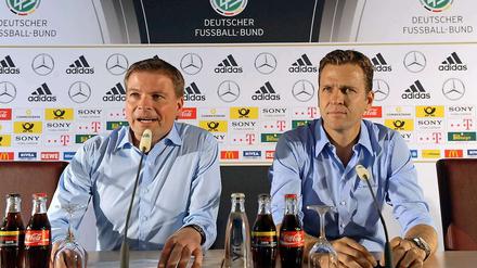 Neu und alt: DFB-Presschef Jens Grittner und Teammanager Oliver Bierhoff (r.).