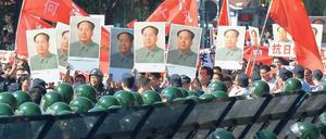 Verklärung. Auch am Dienstag gab es wieder Massenproteste vor der japanischen Botschaft in Peking. Der Jahrestag des Mukden-Zwischenfalls, der 1931 zur Besetzung der Mandschurei durch Japan führte, heizte die Stimmung zusätzlich an. Foto: Mark Ralston/AFP