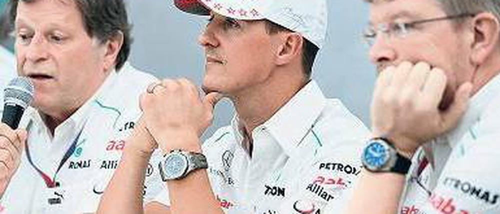 Harmonie zu spielen, das fällt uns schwer. Haug, Schumacher und Brawn (von links) bei der Abschiedsvorstellung. Foto: dapd