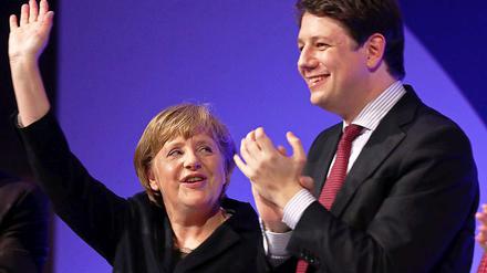 Prominent unterstützt: JU-Vorsitzender Philipp Mißfelder neben der Bundeskanzlerin.