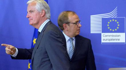 Wo gehts lang? Der finnische Notenbanker Liikanen (r.) und sein Auftraggeber, EU-Kommissar Barnier, stellen den Bericht in Brüssel vor.