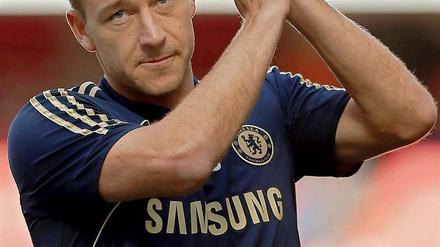 Der englische Fußballer John Terry akzeptiert seine Strafe wegen rassistischer Äußerungen im Oktober 2011.