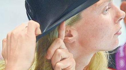 Alles weggesteckt. Nach schwachen Leistungen bei Olympia in London wechselt Britta Steffen nun ihren Trainer und zieht zu ihrem Freund Paul Biedermann nach Halle. Foto: dpa