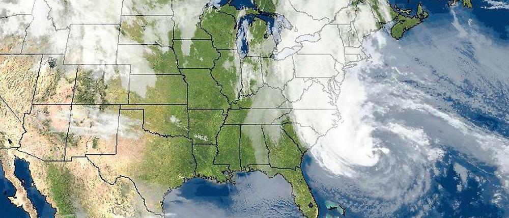Im Angesicht des Sturms. Das Foto stammt von der Universität Wisconsin und zeigt die gewaltige Ausdehnung von „Sandy“. Foto: AFP
