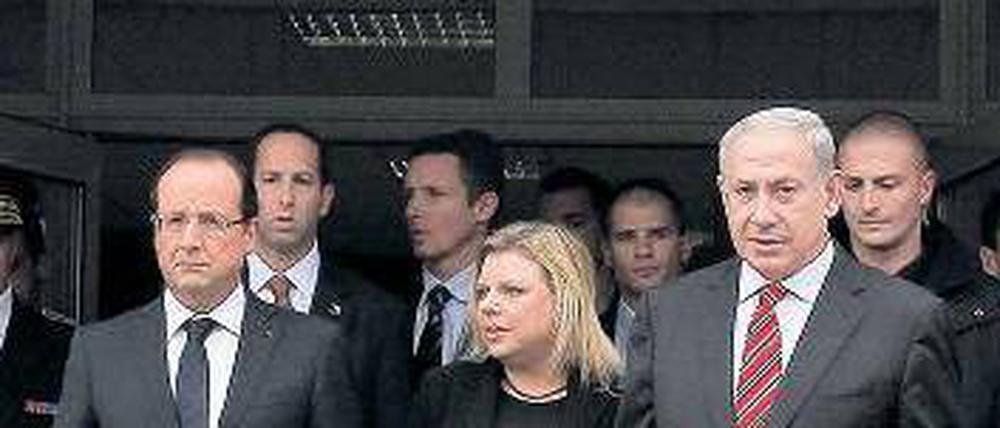 Am Tatort. Hollande (l.) und Netanjahu nach der Gedenkfeier in Toulouse.Foto: dpa