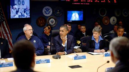 Krisenmanager. Barack Obama mit dem Helferstab.