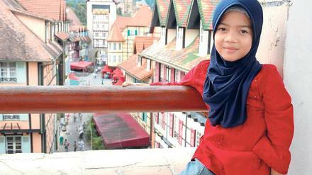 Good old Europe. Colmar tropicale – nicht nur für diese malaiische Besucherin eine beschauliche kleine Welt. 