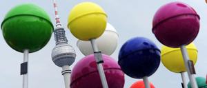 So bunt wie Berlin sind die Spitzen deutscher Konzerne nicht besetzt.