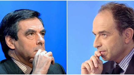Der ehemalige französische Premier Francois Fillon (links) und der derzeitige UMP-Generalsekretär Jean-Francois Cope