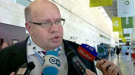 In der Nacht auf Samstag wird Peter Altmaier nicht viel Schlaf bekommen - aber hoffentlich ein paar Ergebnisse.