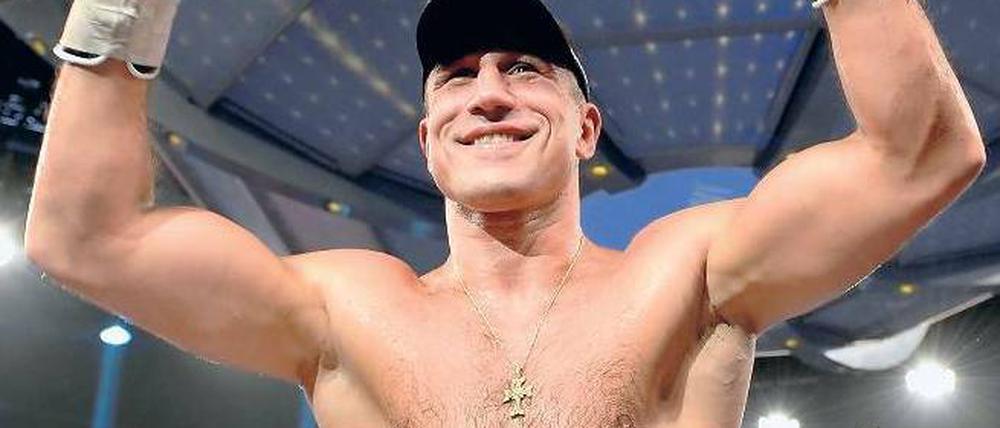 Strahlender Sieger. Arthur Abraham rundet mit seiner erfolgreichen Titelverteidigung ein erfolgreiches Jahr ab. Foto: AFP