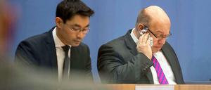 Wirtschaftsminister Rösler und Umweltminister Altmaier wollen beim Thema Energiewende Harmonie demonstrieren.