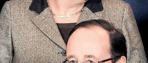 Pariser Überraschungen: Die Kanzlerin und Frankreichs Präsident Foto: dpa