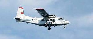 Provokante Mission. Diese Aufklärungsmaschine der chinesischen Marine versetzte am Donnerstag acht japanische Kampfflugzeuge über der umstrittenen Inselgruppe in Alarmbereitschaft. Foto: dpa