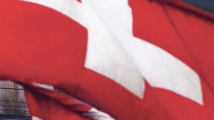 Teures Eingeständnis. Die Schweizer Bank musste mit der Zahlung auch ein formales Schuldbekenntnis abgeben. Jetzt könnten geprellte Anleger klagen. Foto: AFP
