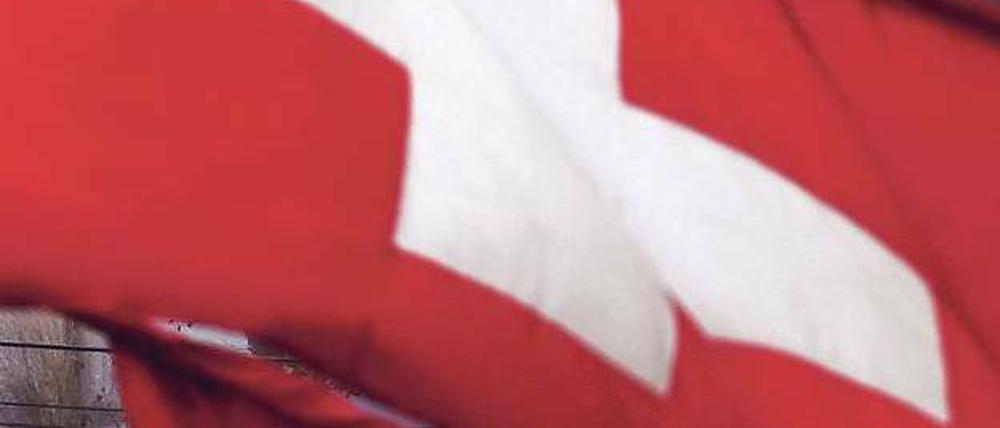 Teures Eingeständnis. Die Schweizer Bank musste mit der Zahlung auch ein formales Schuldbekenntnis abgeben. Jetzt könnten geprellte Anleger klagen. Foto: AFP