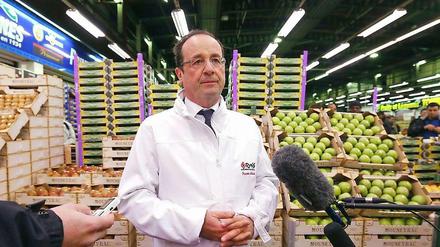Gute Stimmung machen auf dem Großmarkt: Francois Hollande.