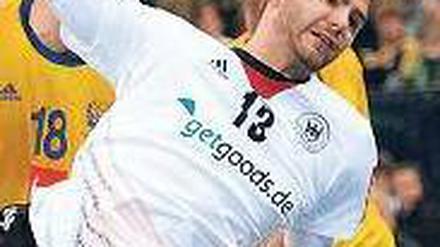 Finales Glück. Christoph Theuerkauf trifft zum Ausgleich gegen Schweden. Foto: dpa