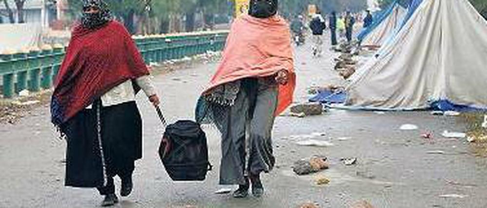 Rückzug. Teilnehmer des „Marschs der Millionen“ verlassen Islamabad. Foto: rtr