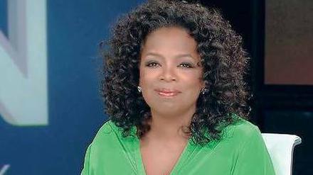 Ihr Kinderlein, kommet ... Oprah Winfrey nimmt Beichten ab. Foto: AFP