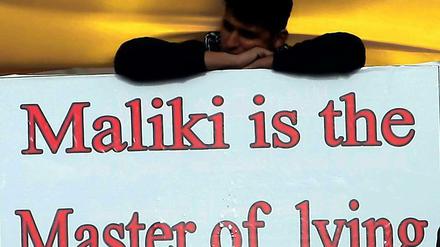 Sunnitischer Demonstrant in Baghdad: Protest gegen Malikis pro-schiitische Gesetzgebung.