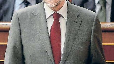 Mariano Rajoy muss nicht mehr nur seine Sparmaßnahmen rechtfertigen. Foto: AFP