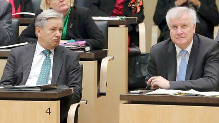 Der eine zahlt (links), der andere profitiert (rechts) - der Länderfinanzausgleich soll jetzt vors Bundesverfassungsgericht.