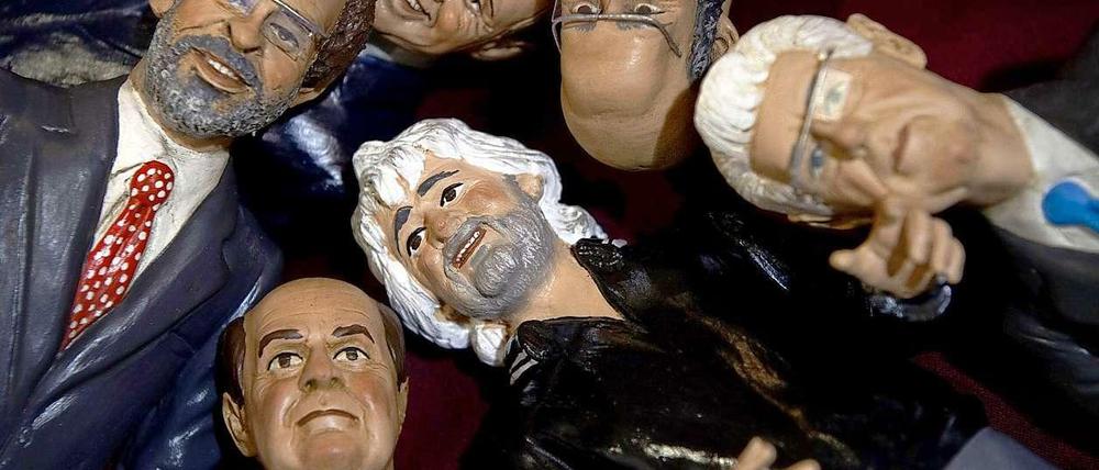 Welcher Pappkamerad wird es? Figuren italienischer Politiker.