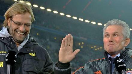 Im Land des Lächelns: So vergnügt wie auf diesem Bild aus dem November 2011 sind die beiden Bundesligatrainer Jürgen Klopp (l.) und Jupp Heynckes zurzeit nicht.