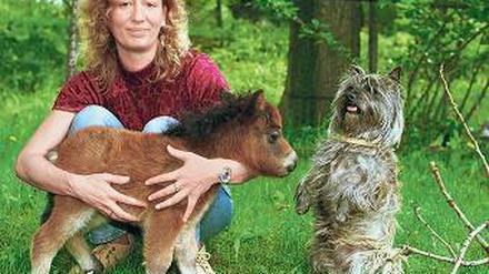 Von Gott be-fohlen. Es gibt immer Gründe, ein Tierbaby abzubilden. Foto: dpa