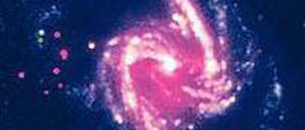 Galaxie im Röntgenlicht. NGC 1365 ist 60 Millionen Lichtjahre entfernt. Diese Aufnahme basiert auf kombinierten Daten der Weltraumteleskope "XMM-Newton" und "Nustar".