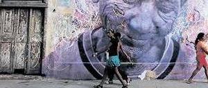 Kunst und Alltag. Aus Anlass der Havanna-Biennale 2012 haben José Parlá und der französische Graffiti-Künstler JR Porträts älterer Bewohner der Stadt geschaffen. Foto: Reuters