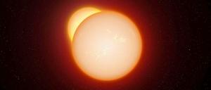 Doppelsterne. Die künstlerische Darstellung zeigt zwei Sterne, die sich - von der Erde aus gesehen - regelmäßig überdecken. Mithilfe solcher Himmelskörper haben Astronomen jetzt die Entfernung der Großen Magellanschen Wolke genauer bestimmt. 