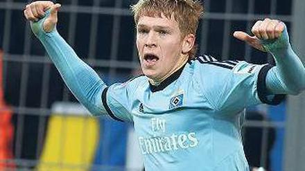 Die Tore zum Glück. Der Lette Artjoms Rudnevs hat für den Hamburger SV nach holprigem Beginn bereits elf Saisontreffer erzielt. Foto: AFP