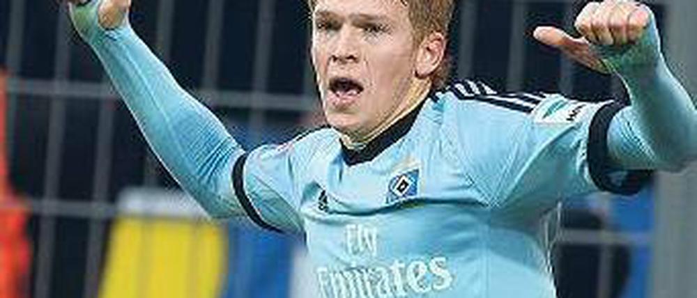 Die Tore zum Glück. Der Lette Artjoms Rudnevs hat für den Hamburger SV nach holprigem Beginn bereits elf Saisontreffer erzielt. Foto: AFP
