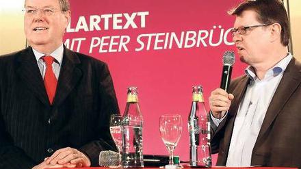 Vernunftpartner. SPD-Kanzlerkandidat Peer Steinbrück und der Parteilinke Ralf Stegner haben sich zusammengerauft. Foto: Bodo Marks/dpa