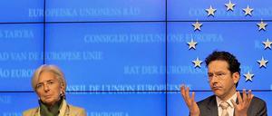 Erklärungsbedarf: Nach der Einigung in der Nacht erläutert Europgruppen-Präsident Jeroem Dijsselbloem das Rettungspaket für Zypern. Währungsfonds-Chefin Christine Lagarde lauscht.