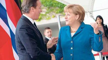 Bilaterale Begegnung. Merkel und Cameron 2012 vor dem Kanzleramt. Foto: dpa