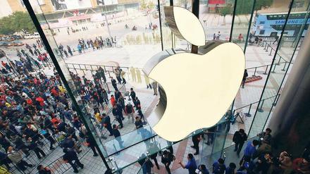 Reich und arm. Apple hat 2012 außerhalb der USA 27 Milliarden Euro verdient – darauf aber nur 1,9 Prozent Steuern gezahlt. Foto: dpa