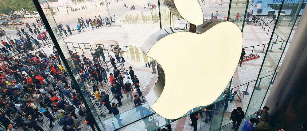Reich und arm. Apple hat 2012 außerhalb der USA 27 Milliarden Euro verdient – darauf aber nur 1,9 Prozent Steuern gezahlt. Foto: dpa