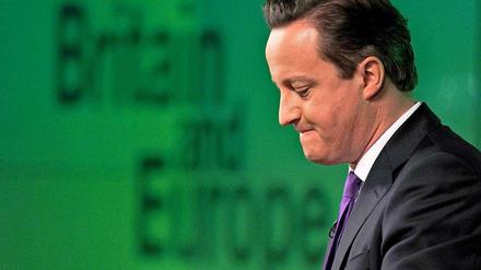 Unter Druck. Der britische Premierminister Cameron hat immer größere Mühe, seine Partei zusammenzuhalten.